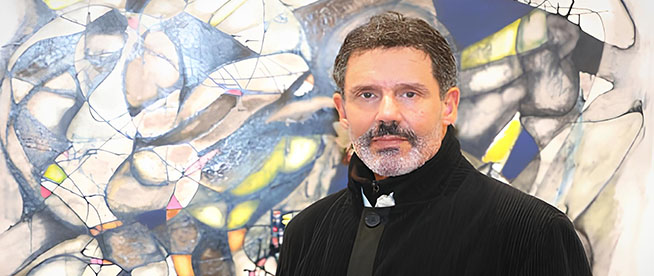 Biographie</br>
Hassan Kouhen
